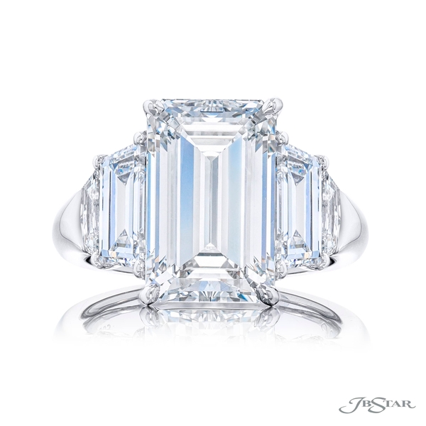 6.02 ct. GIA certified emerald-cut diamond center set between two trapezoid diamonds and two epaulet diamonds. 7236-005