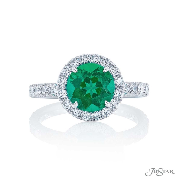 Emerald and diamond ring featuring a 1.73 ct. round emerald in a round pave setting. 1061-127