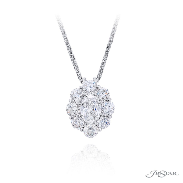 Diamond pendant featuring a 1.00 ct. oval center encircled by round diamonds in a beautiful flower design.0819-030