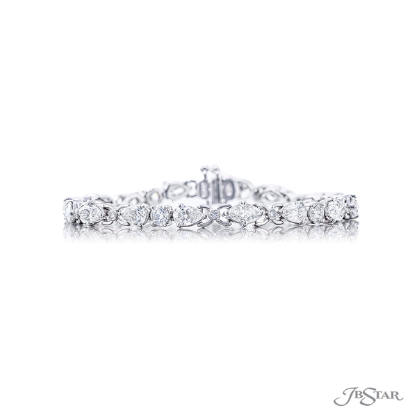Diamond bracelet featuring 10 pear shaped, 6 marquise, and 5 round diamonds. 2592-001v2