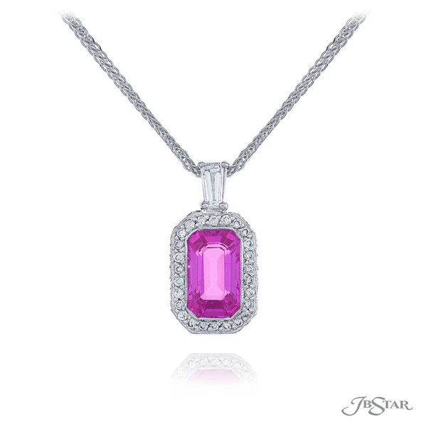 Pink sapphire and diamond pendant featuring a 3.11 ct. emerald cut pink sapphire center surrounded by micro pave.0206-009