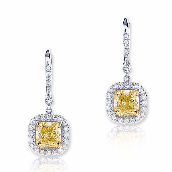 fancy yellow diamond drop earrings featuring 2 fancy yellow GIA certified radiant-cut diamonds surrounded by micro pave.jpg