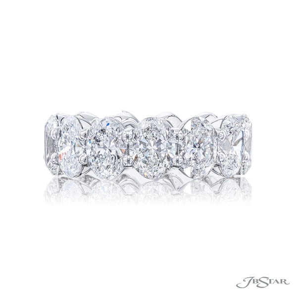 Diamond eternity band featuring 16 oval diamonds in a shared prong setting. 7197-005