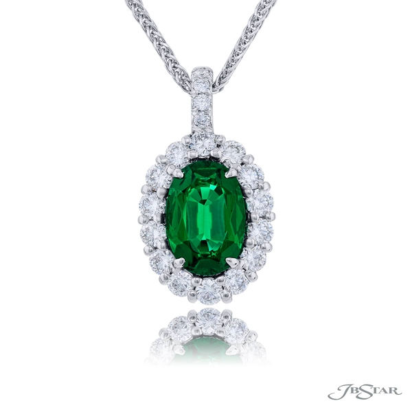 Emerald pendant featuring a beautiful 1.47 ct. oval emerald encircled by round diamonds.0698-026-1