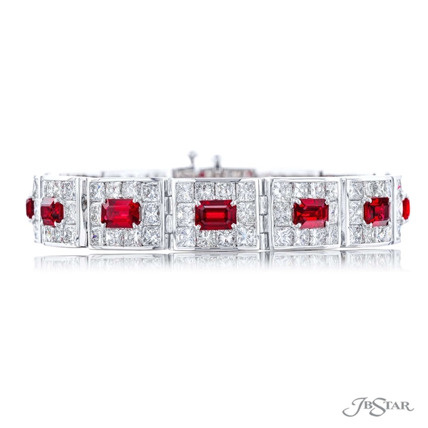 Ruby and diamond bracelet featuring emerald-cut rubies encircled by radiant-cut diamonds.5820-001_1