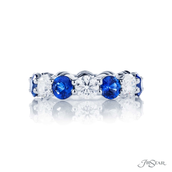 Sapphire and diamond eternity band featuring 7 round sapphires and 7 round diamonds in an alternating shared prong setting.0998-020