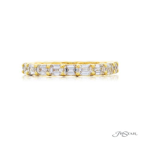 Diamond eternity band featuring 20 emerald-cut diamonds in our east to west design. Handcrafted in 18k yellow gold. 2646-023