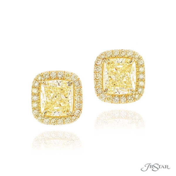 Fancy yellow diamond studs featuring 2 GIA certified fancy yellow cushion-cut fancy yellow diamonds edged in fancy yellow round diamond pave. Handcrafted in 18KY gold.2745-053