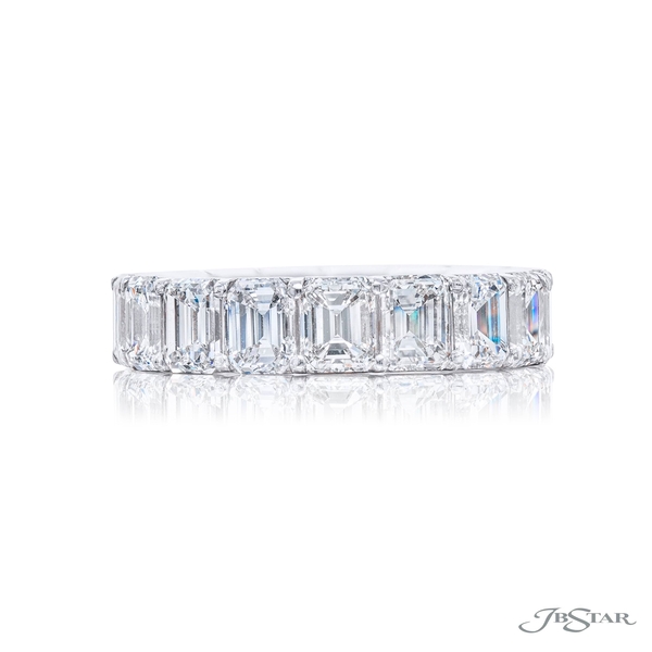 Diamond eternity band featuring 17 perfectly matched emerald-cut diamonds in a shared prong setting. 2016-001