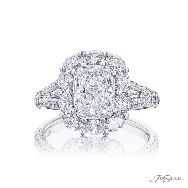 2.31 ct. GIA-certified cushion-cut center encircled by oval and round diamonds in a shared prong setting and embraced by tapered baguette in a micro pave setting. 5273-001