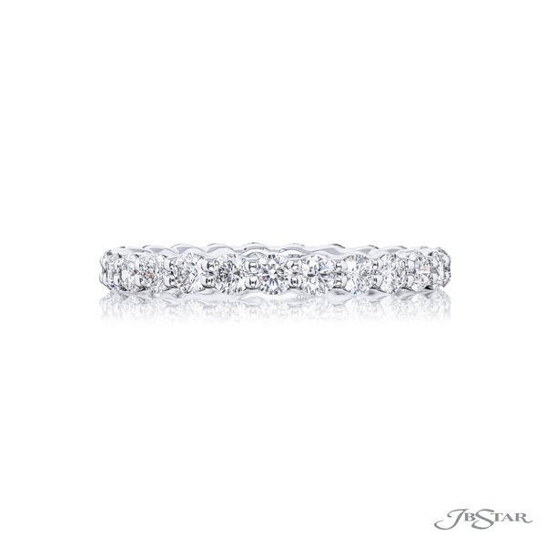 Diamond eternity band featuring 25 perfectly matched round diamonds in a shared prong setting. 7031-023