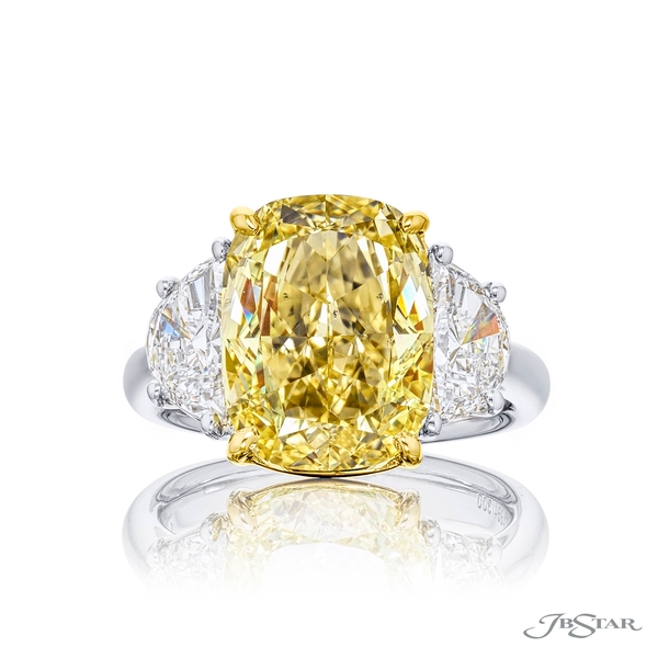 6.51 ct. GIA certified fancy yellow cushion-cut diamond embraced by two half-moon diamonds. 4664-300