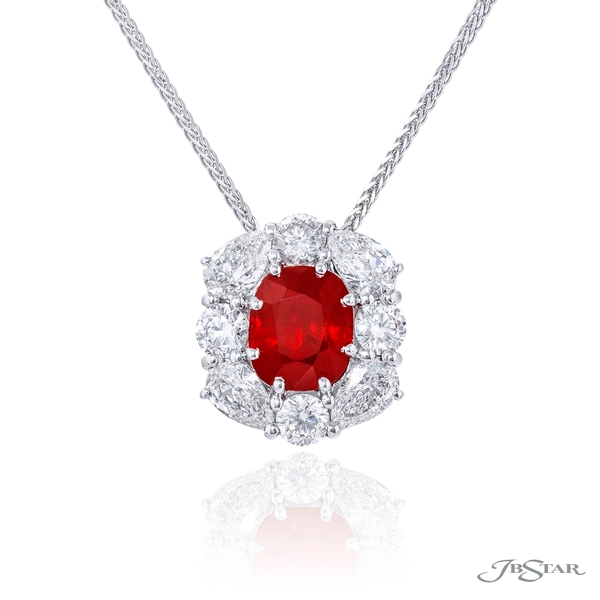 Ruby pendant featuring a 3.04 ct. CDC Burma certified cushion center encircled by pear and round diamonds. 2474-006