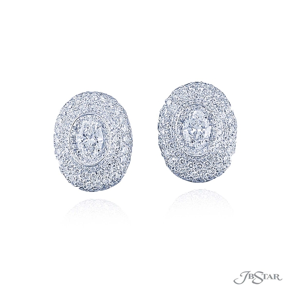 Stud earrings featuring oval diamonds surrounded by round diamond pave. 0448-002