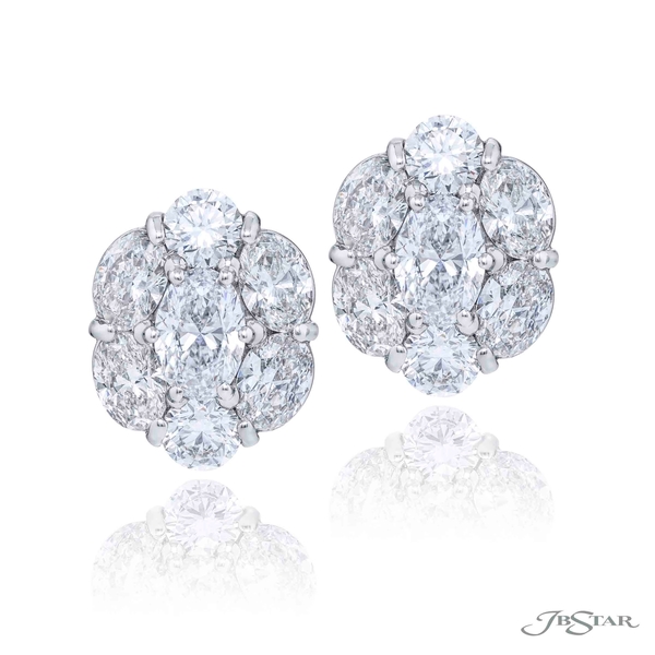 Diamond stud earrings featuring oval center with oval-cut and round diamonds. 5865-001