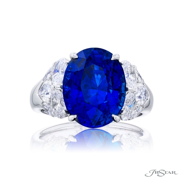 Sapphire and diamond ring featuring an 8.51ct. certified oval sapphire embraced by marquise pear-shape and oval diamonds. 7373-002
