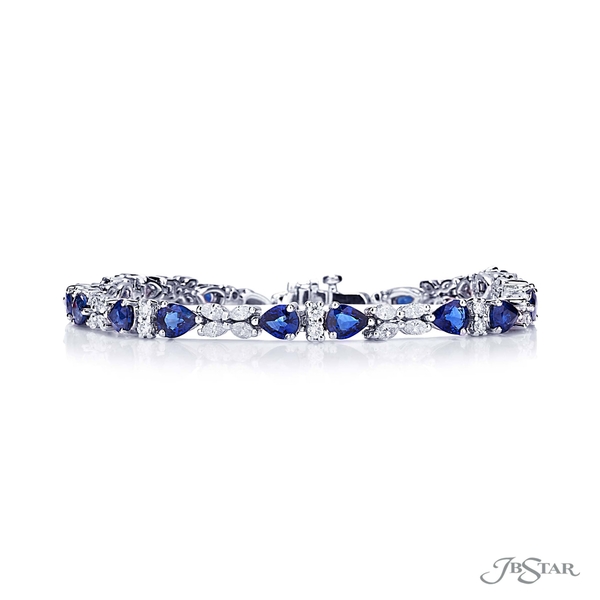 Sapphire and diamond bracelet featuring 18 pear-shape sapphires in a design with marquise and round diamonds. 6088-001