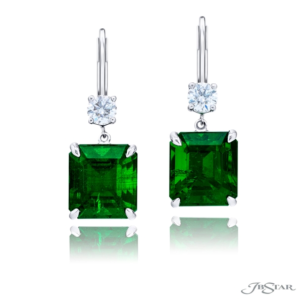 Emerald and diamond earrings featuring 2 vivid green octagonal step cut emeralds with round diamond. 1199-123