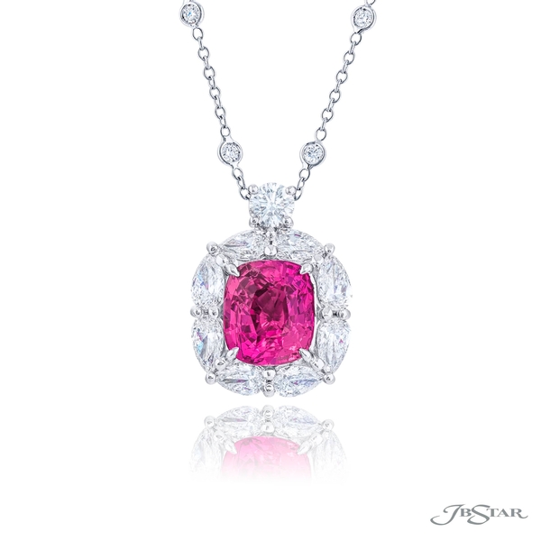 Pink sapphire pendant featuring a 4.01 ct. cushion center encircled by pear and round diamonds.2474-007