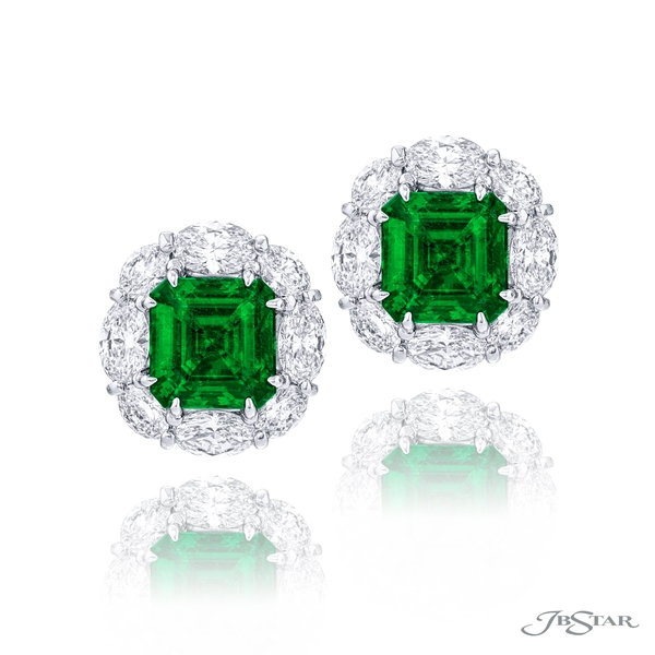 Emerald and diamond stud earrings featuring 2 brilliant square emeralds encircled by oval diamonds. 0779-079