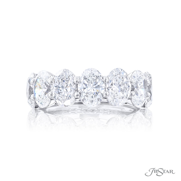 Wedding band featuring 7 beautiful GIA certified oval diamonds in a shared prong setting. 5496-002