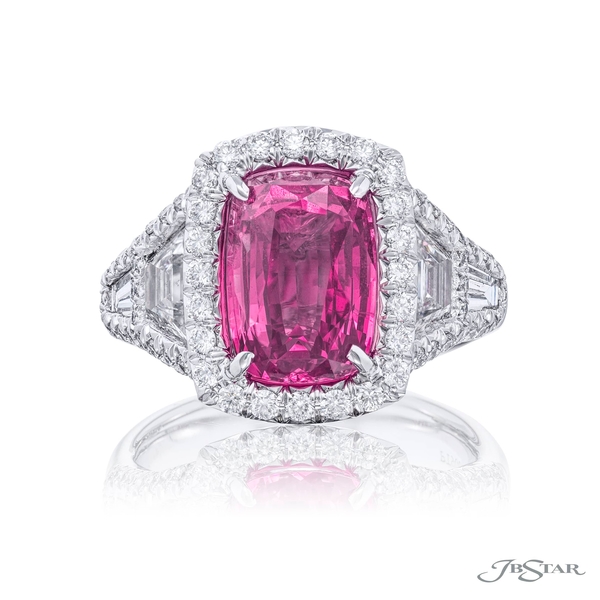 Pink sapphire and diamond ring featuring a 4.70 ct. certified emerald-cut pink sapphire embraced by trapezoid and tapered baguette diamonds in a micro pave setting.7140-024