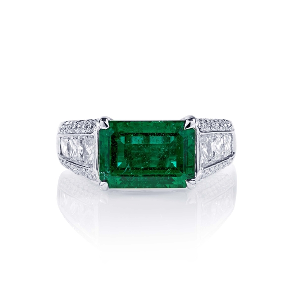 3.21 emerald cut emerald east to west pave diamond ring.jpg