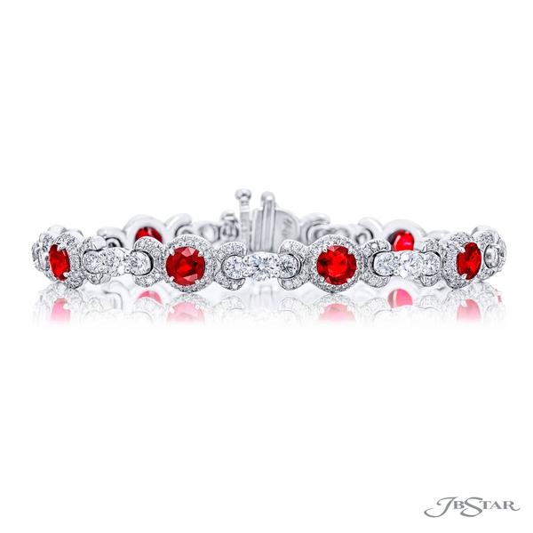Ruby and diamond bracelet featuring 9 beautifully matched round rubies individually set in micro pave linked together round diamonds.3993-003-1