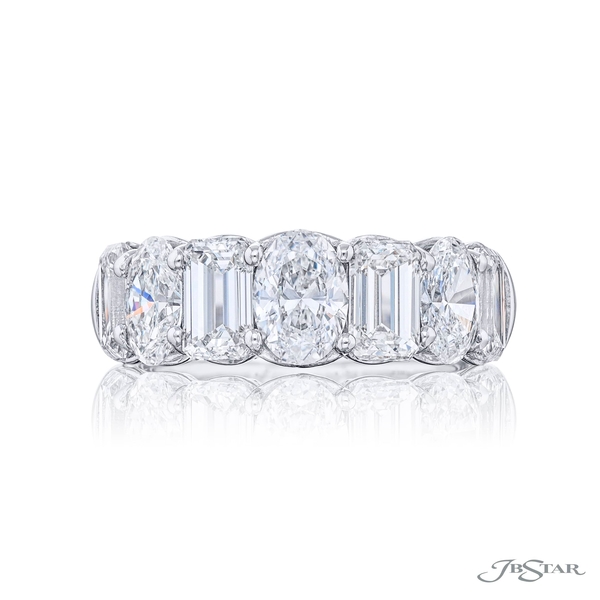 Band featuring 4 emerald-cut and 3 oval diamonds in a shared prong setting. 7581-006