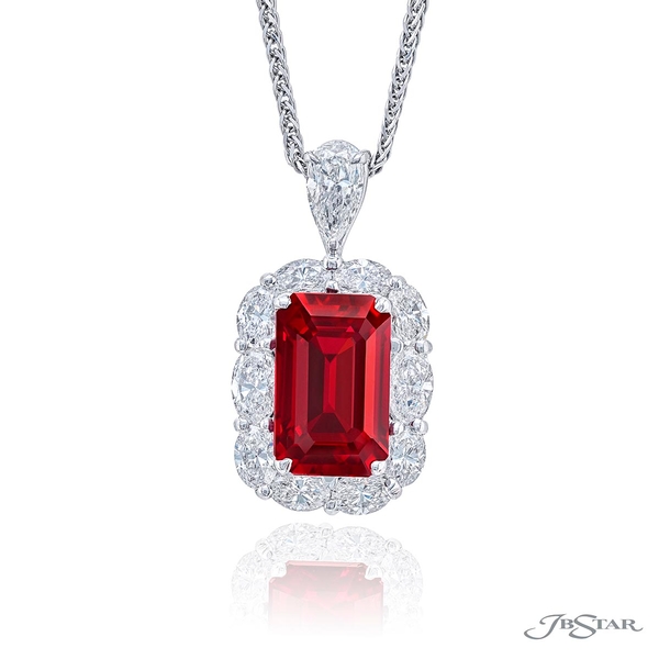 Ruby and diamond pendant featuring a magnificent 4.10 ct emerald cut Burma ruby encircled with oval diamonds. Handcrafted in pure platinum.0779-010