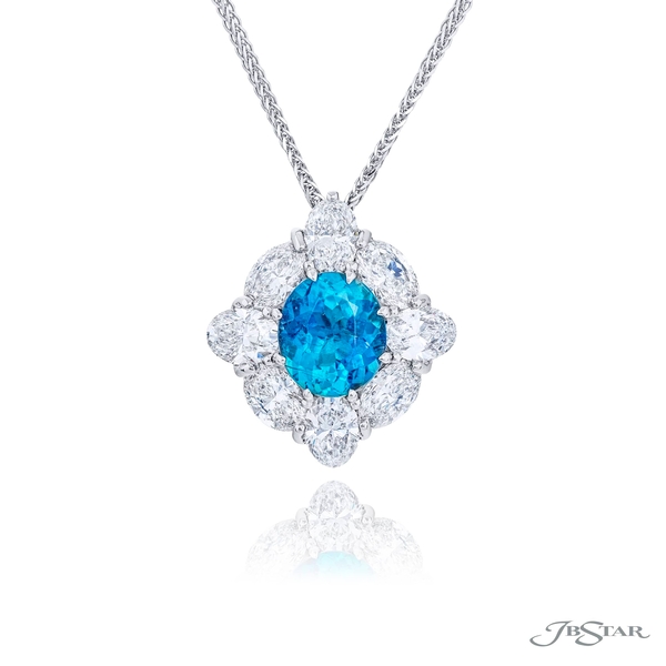 Paraiba and diamond pendant featuring a 2.68 ct. GIA Certified oval center encircled by round and oval diamonds.1647-025