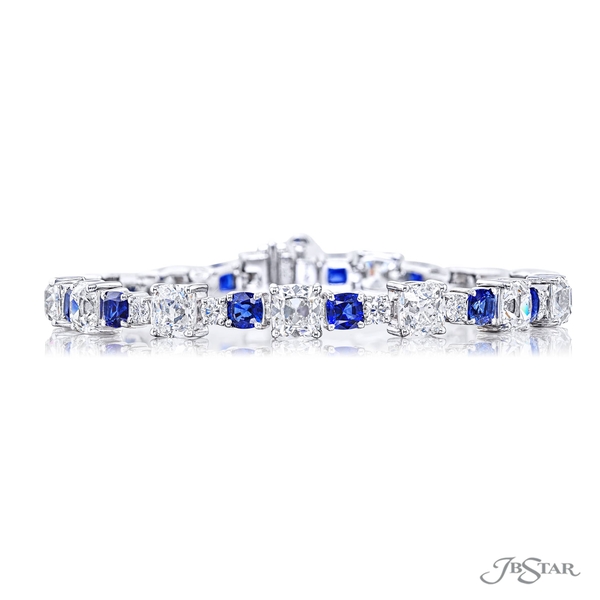 Diamond and sapphire bracelet featuring cushion-cut diamonds and sapphires accented with round diamonds in an alternating design. 5783-001