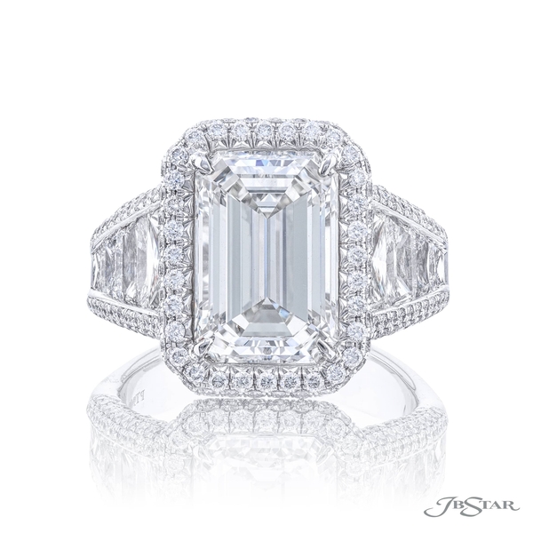 5.04 ct. GIA certified emerald cut diamond embraced by trapezoid diamonds in a micro pave setting. 7007-046