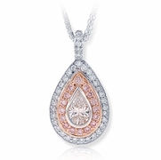 0.54 ct. certified pear shape diamond center surrounded by beautiful round pink and white diamonds.jpg