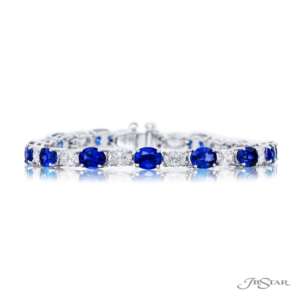 Sapphire and diamond bracelet featuring 14 oval sapphires and 14 brilliant oval diamonds in a shared prong setting. 2063-001