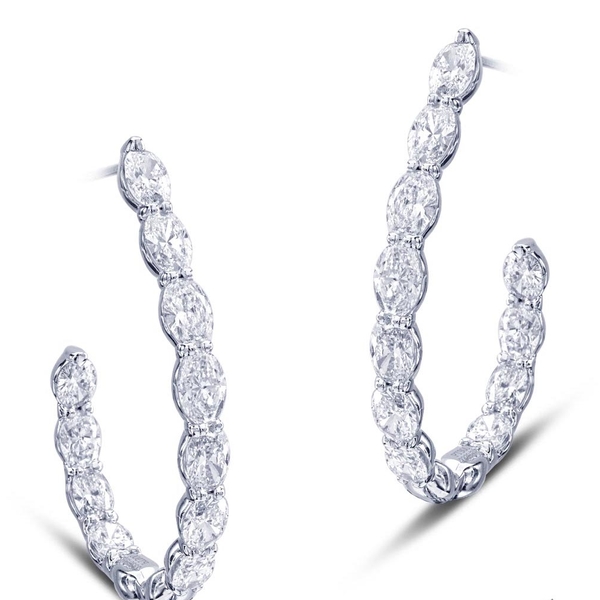 hoop earrings featuring 22 oval diamonds in a shared prong setting.jpg