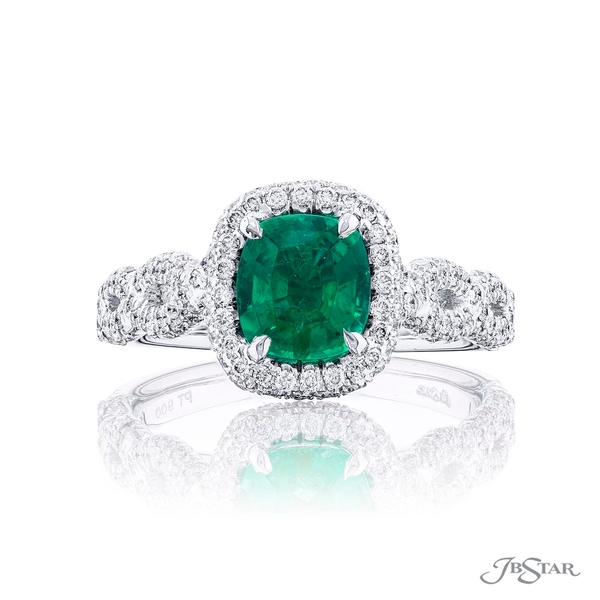 Emerald and diamond ring featuring a 1.01 ct. emerald-cut emerald accompanied by round diamonds in a micro pave setting.1987-023