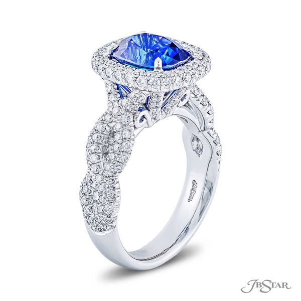 Handcrafted blue sapphire and diamond ring featuring a stunning 3.30ct certified Sri Lanka cushion-cut blue sapphire encircled in round diamonds pave with a braided shank.1985-003v2