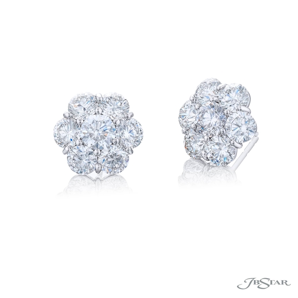 Diamond stud earrings featuring 2 GIA certified round diamonds encircled by round diamonds. 2719-024