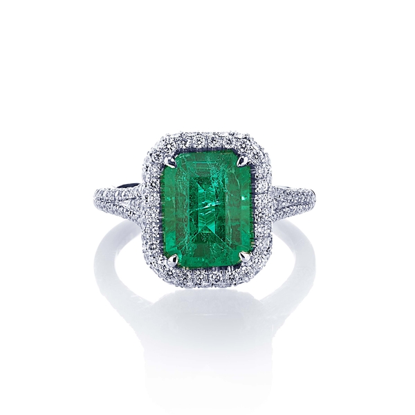 3.08 emerald cut emerald and pave halo ring.jpg