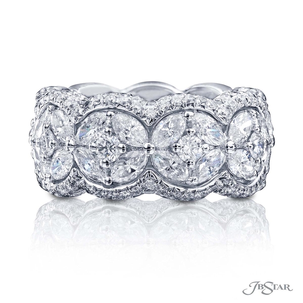Diamond eternity band featuring marquise and round diamonds in a prong setting edged in round diamond micro pave. Handcrafted in platinum.0162-002