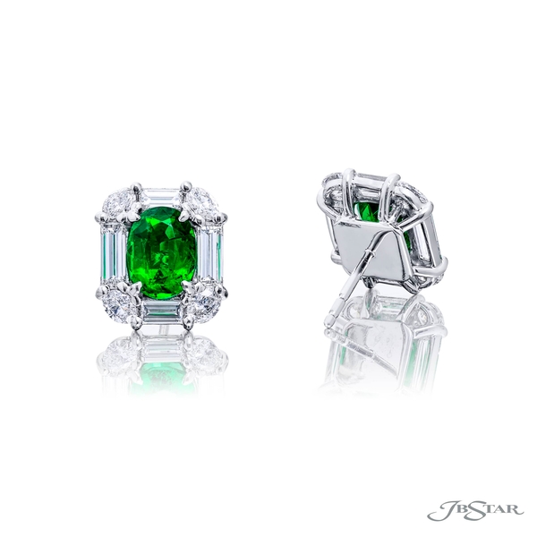 Vivid green emerald and diamond stud earrings featuring two matching emerald-cut emeralds encircled by straight baguettes and round diamonds. 1621-022