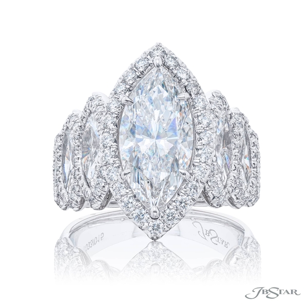 3.01 ct. GIA certified marquise diamond center with marquise and round diamonds in a micro pave setting. 7033-015
