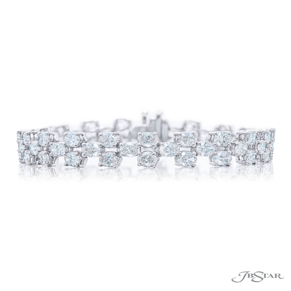 Diamond bracelet featuring 3 rows of oval-cut diamonds.5983-002
