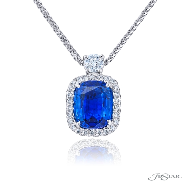 Sapphire and diamond pendant featuring a 2.54 ct. GIA certified cushion cut sapphire embraced by round diamonds. 4962-034
