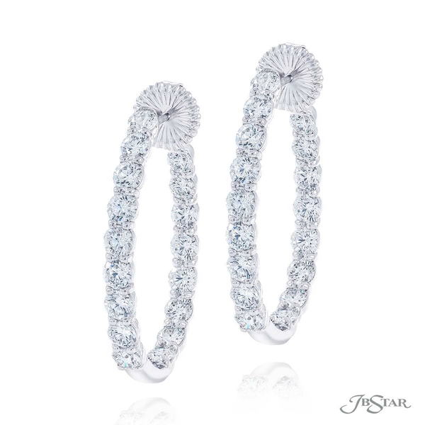 Diamond hoop earrings featuring 34 round diamonds in a shared prong setting. 5665-001