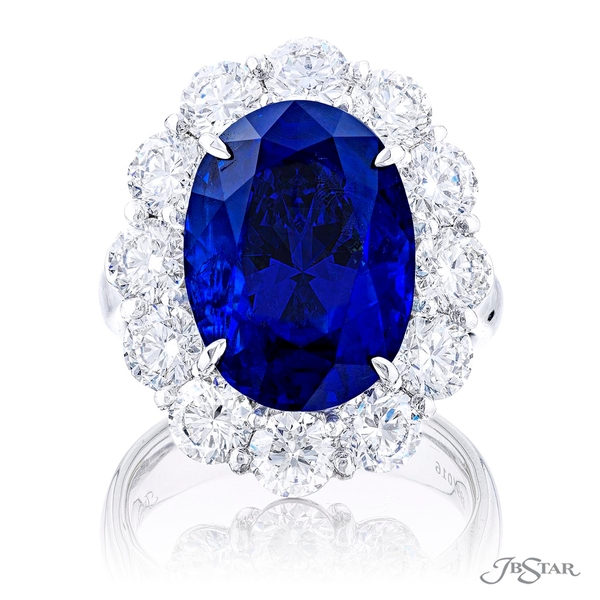 Sapphire and diamond ring featuring a 13.27 ct. certified no-heat Sri Lankan oval sapphire encircled by round diamonds.3013-001