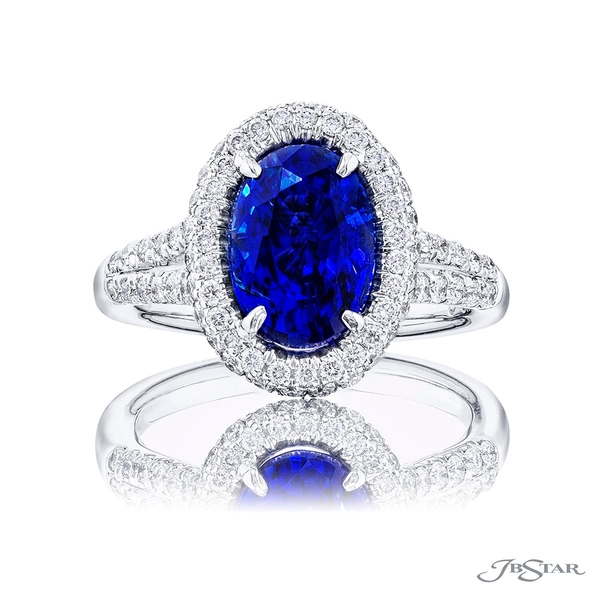 Sapphire and diamond ring featuring a 2.97 ct. oval sapphire in a halo setting with a beautiful split shank. 0974-240