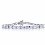 32 emerald cut and round diamonds in a beautiful alternating design.jpg