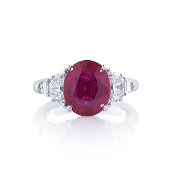 4.44 oval ruby Mozambique and diamond ring.jpg